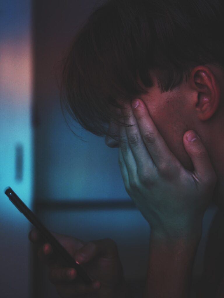 opioid addict checking phone